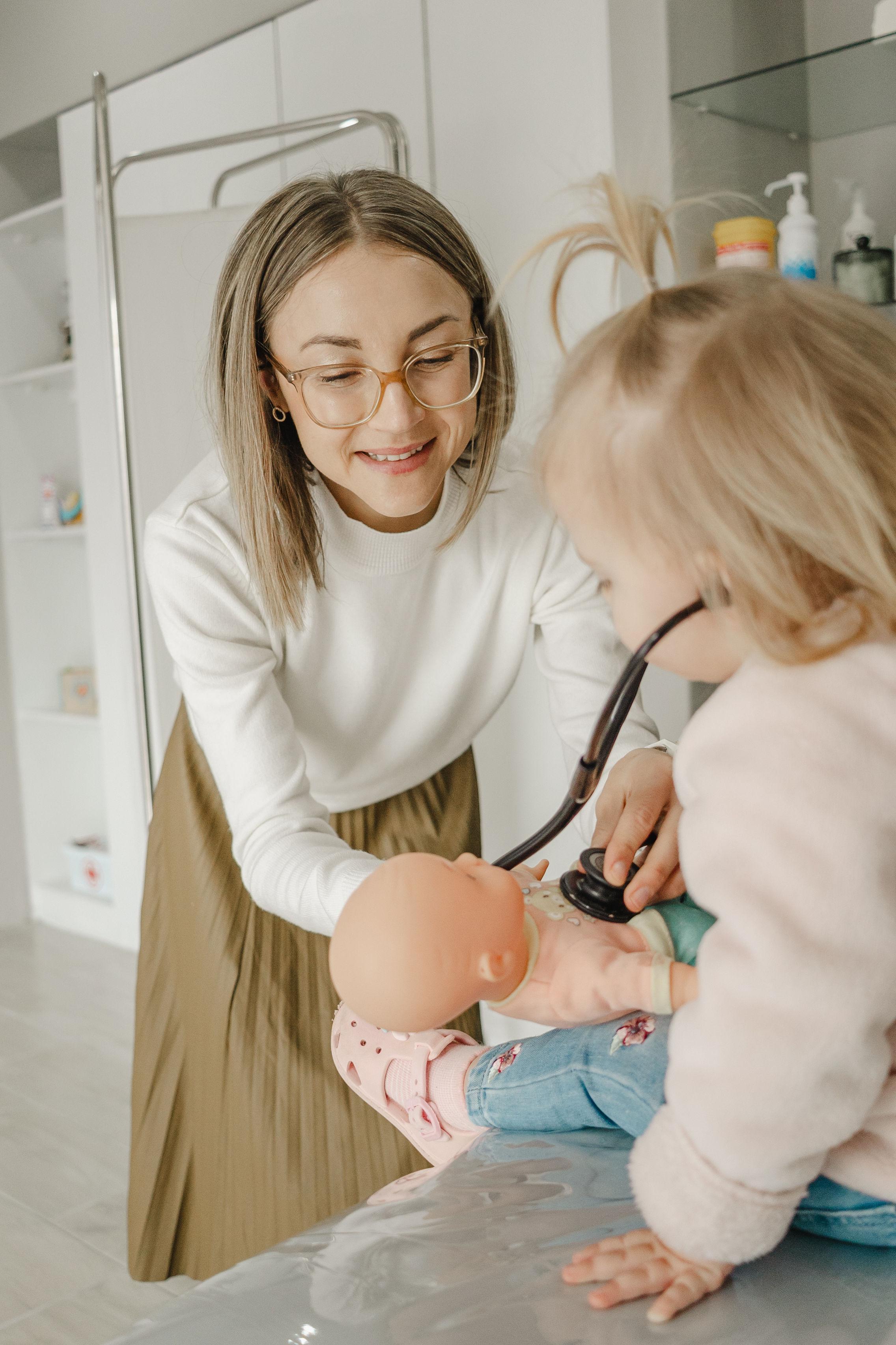 Dr Lana Bouwer examining a young patient during a paediatric consultation